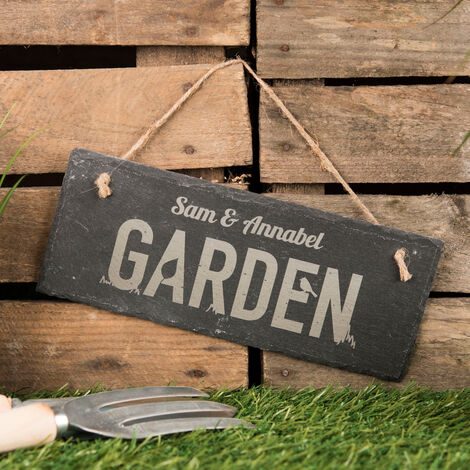 Commission a custom garden plaque featuring the recipient's name or a heartfelt message