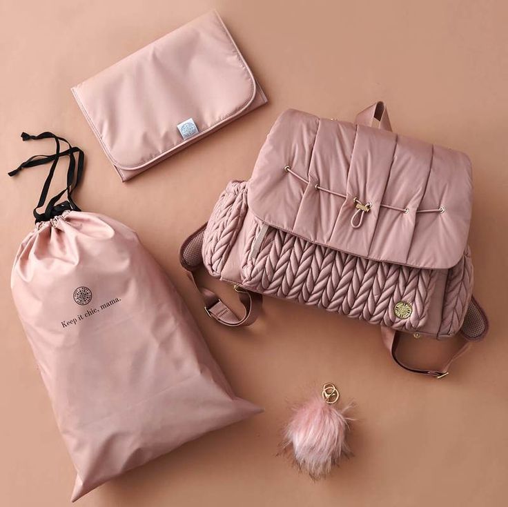 Gift a stylish and functional diaper bag with plenty of pockets and compartments