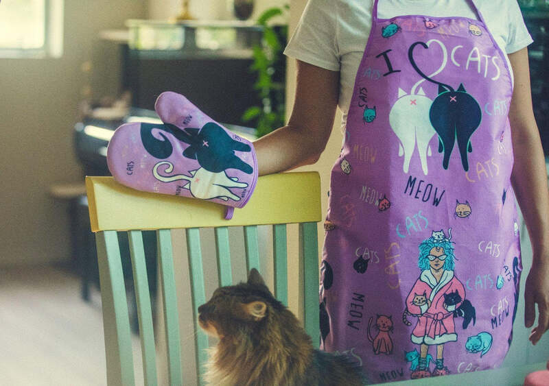 Let them unleash their inner chef with this hilarious cat-themed apron