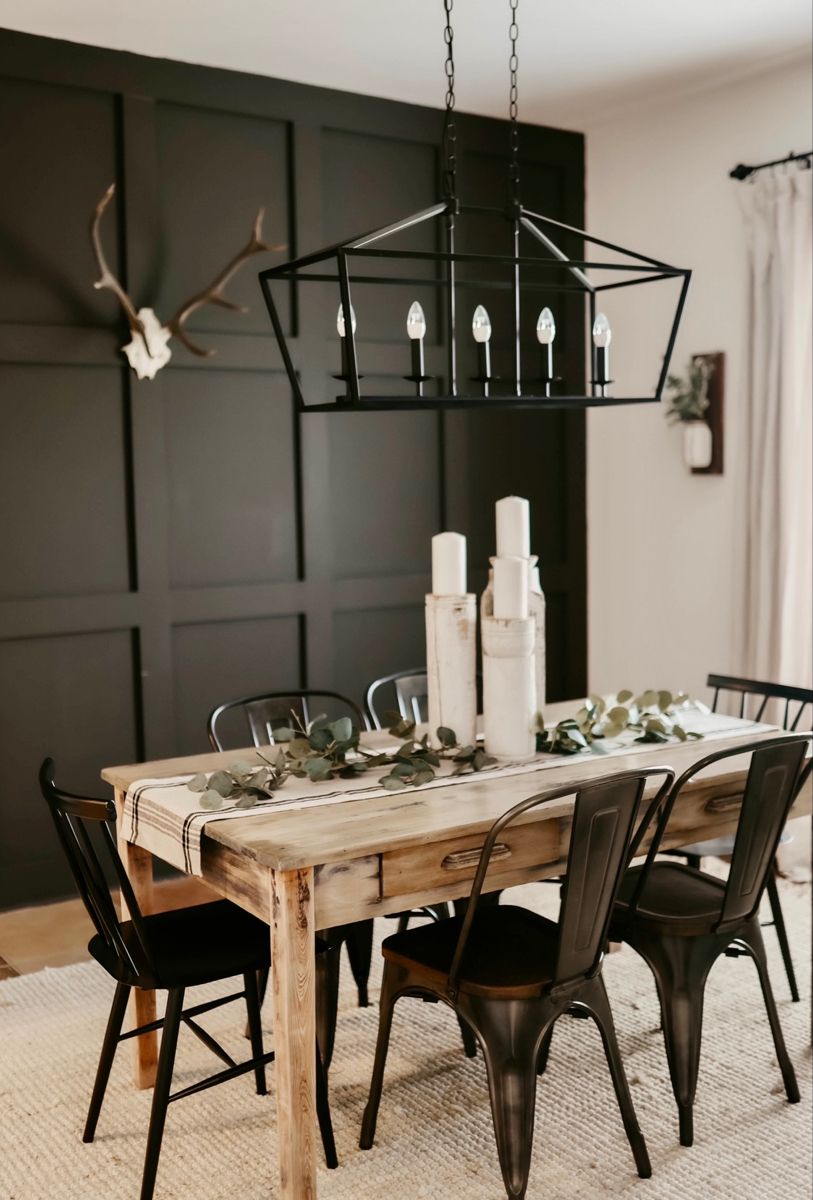 Farmhouse Dining Room with Black Accent Wall